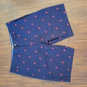 Navy shorts with red crab embroidery.